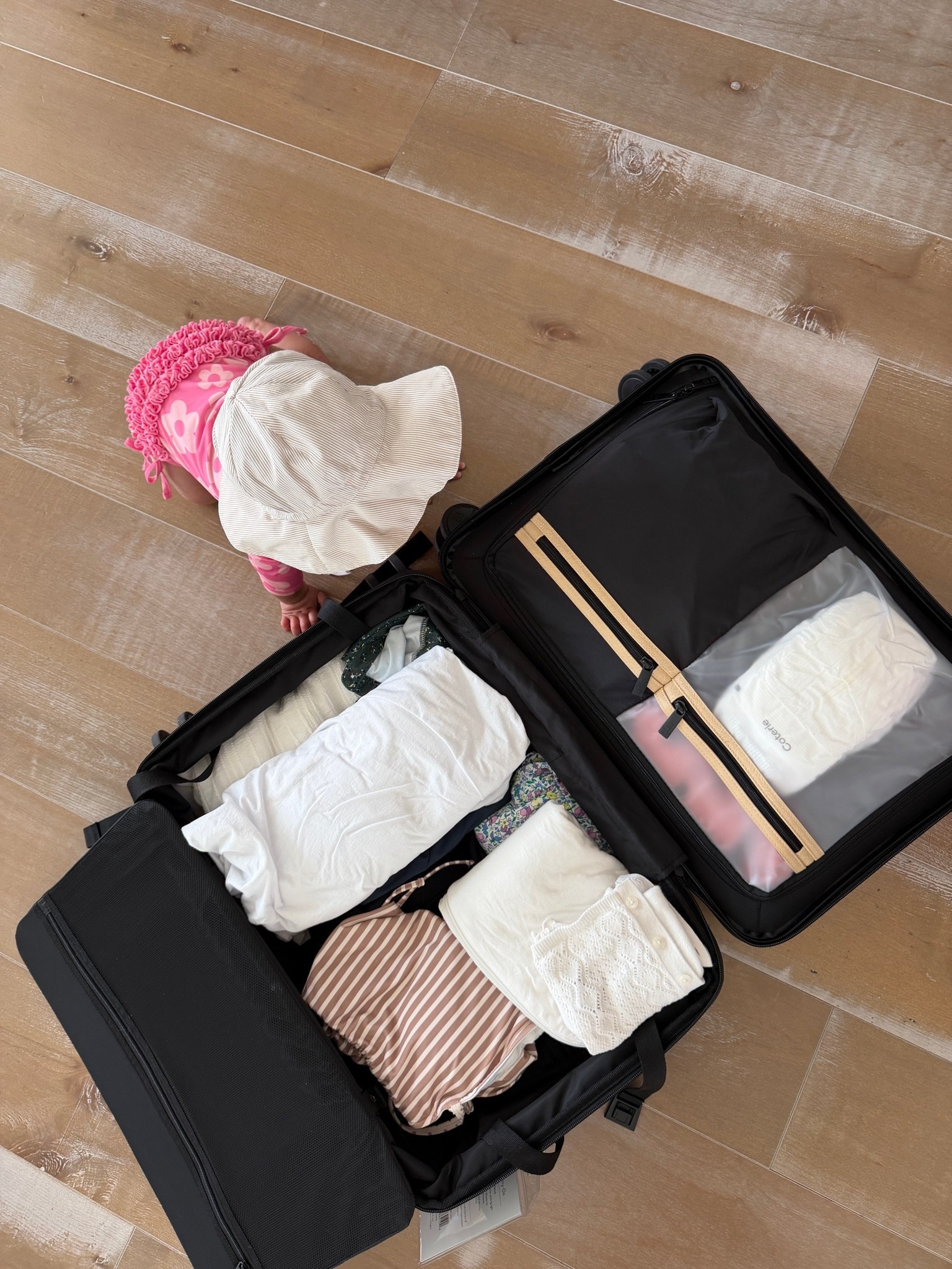 Packing for a little staycation! Using our Beis carry-on luggage in black for the first time. Love how spacious it is and the zippered pockets, especially the one you can use for wet things! Packing my swimsuit, Johnny’s favorite t-shirt, diapers for baby girl and change of clothes.

#LTKmomlife #LTKTravel