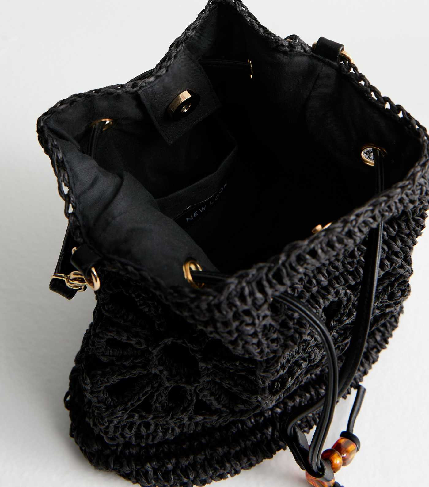 Black Floral Woven Raffia Look Drawstring Bucket Bag | New Look | New Look (UK)