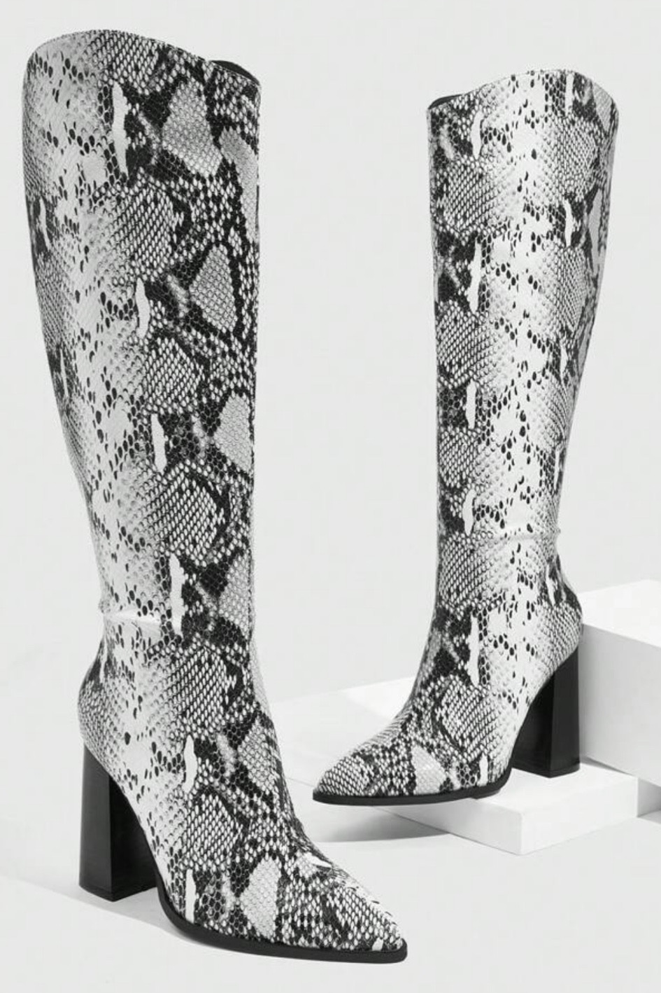 Snake Print Boots with a chunky platform heel

#LTKStyleTip #LTKShoeCrush #LTKFindsUnder50