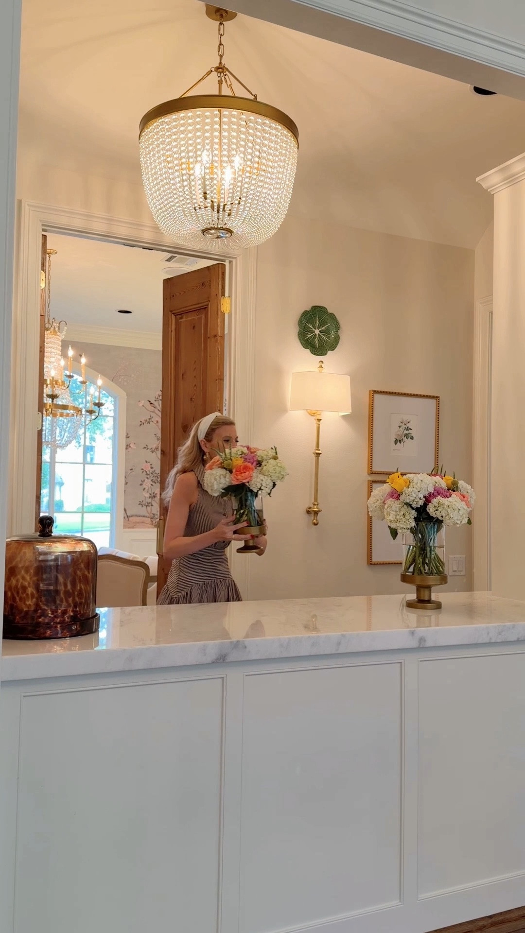 Love my new bar! Gorgeous gold sconces and beaded chandelier plus these luxe look Amazon vases. New Anthropologie dress