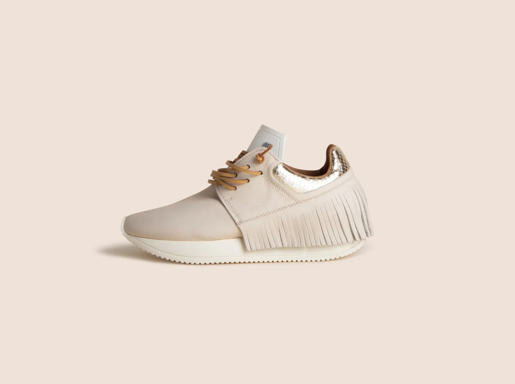 Esseutesse Ivory Leather Fringe Sneaker | SculptHouse