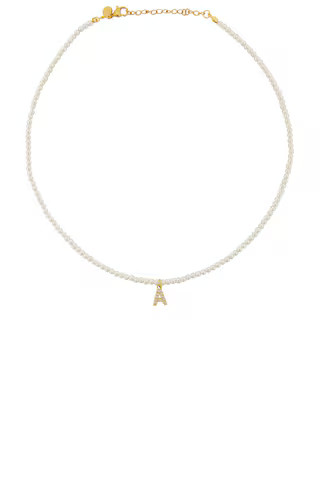 petit moments Initial Pearl Necklace in Gold from Revolve.com | Revolve Clothing (Global)