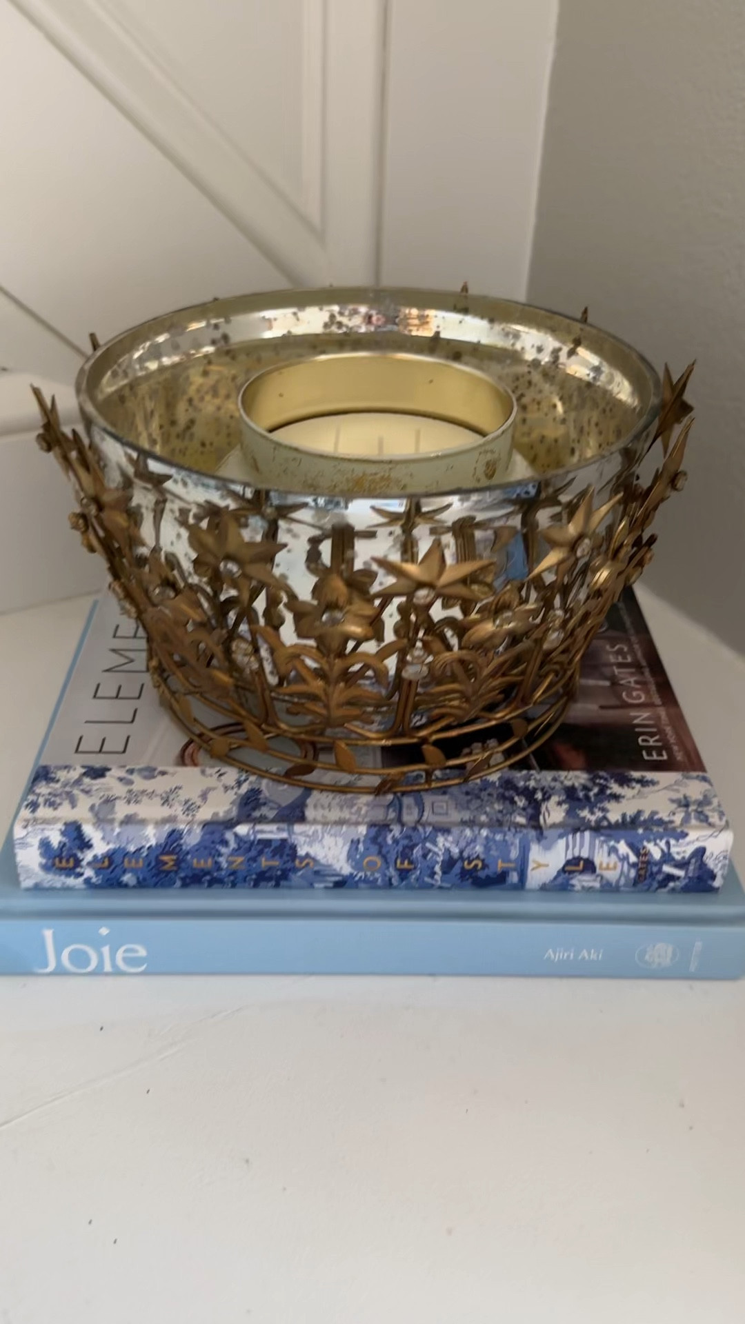 Gold crown and mercury glass candle holder 

#LTKHoliday #LTKHome