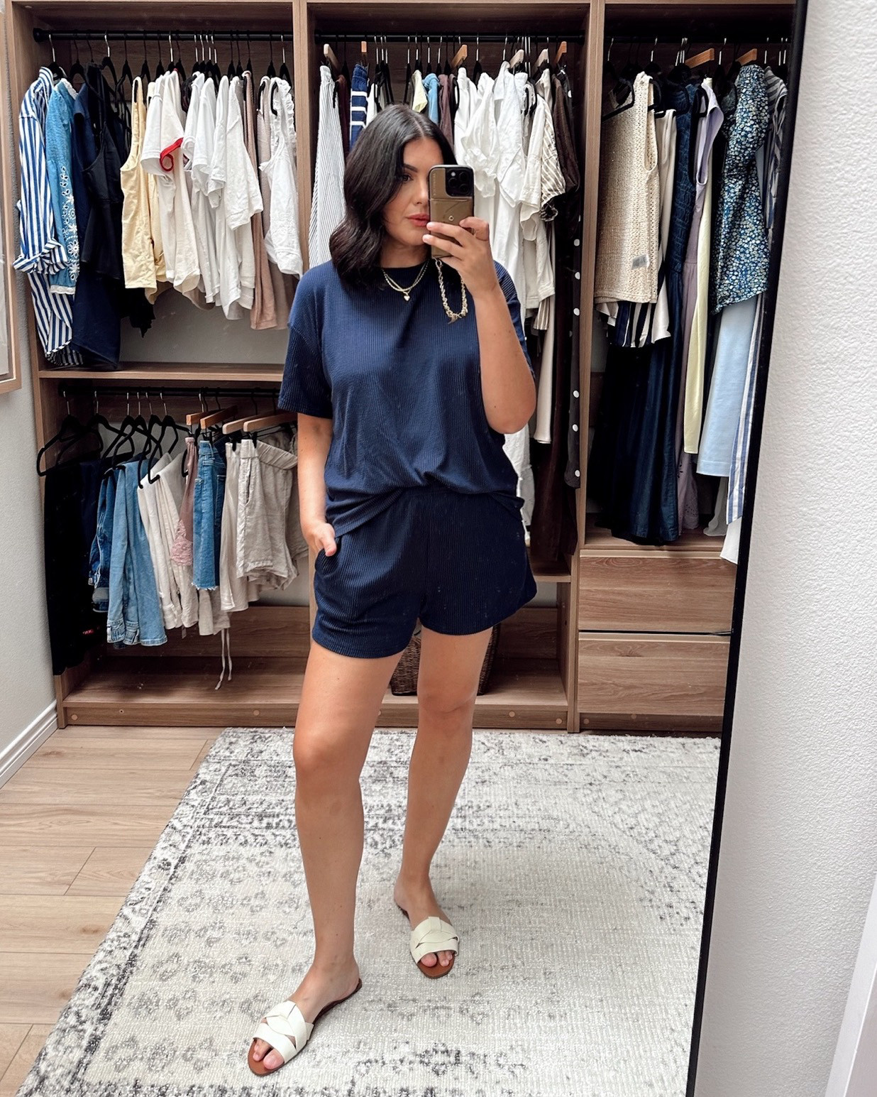 This is the softest little set and it’s a ribbed knit fabric. Very slinky and soft,. The top runs oversized but true and the shorts run just a tad small at the waist for me. Definitely a touch shorter than I was expecting, but overall TTS> I’m in the large.  

 