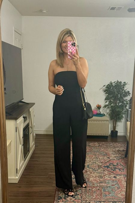 Wide leg jumpsuit from Target. 🖤 It comes in more colors too! For reference I’m 5’7 and wearing a size small. 

#LTKstyletip #LTKfindsunder50 #LTKfindsunder100