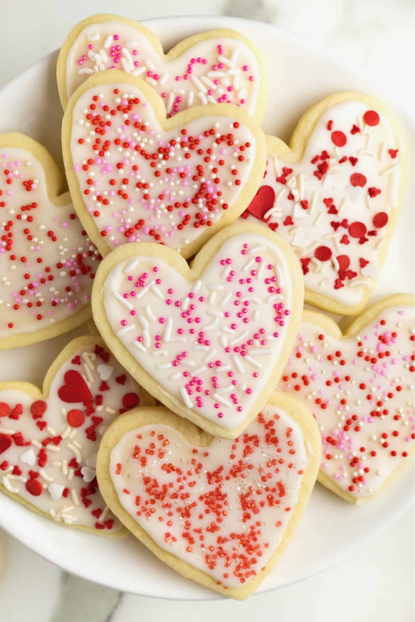 Made with my tried-and-true no-chill sugar cookie dough, Valentine’s Sugar Cookies are easy to make and sweet to eat. They’re even sweeter to share! 💗

#LTKSeasonal