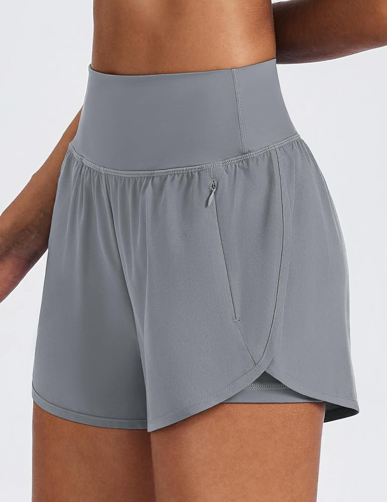PINSPARK Women's 2 in 1 High Waisted Athletic Running Shorts 3" Dolphin Hem Quick Dry Workout Gym... | Amazon (US)