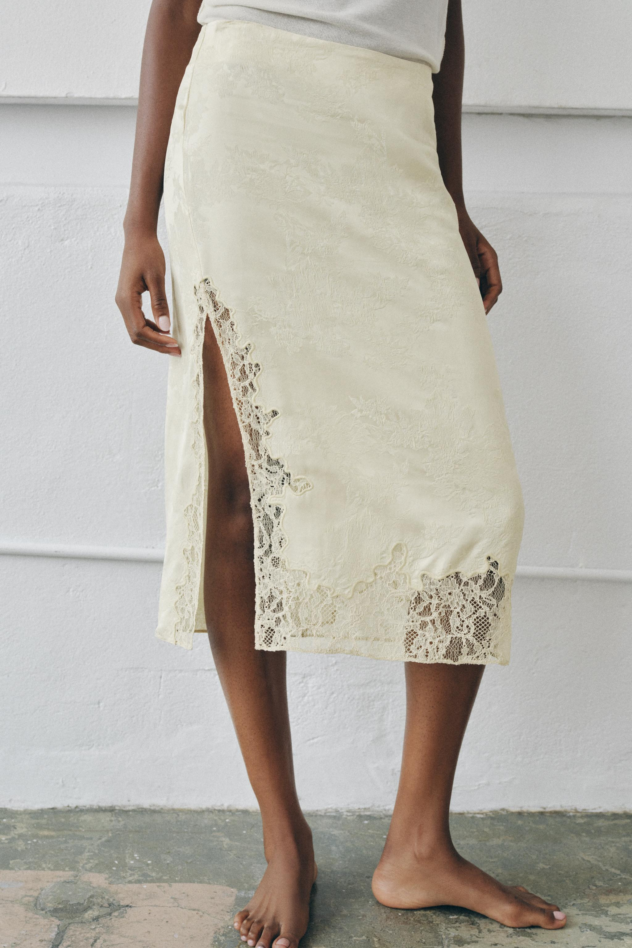 Gr\u00f6\u00dfe des Models: 179 cmMidirock mit mittelhohem Bund aus reinem Viskosegewebe. Mit far... | Zara DE