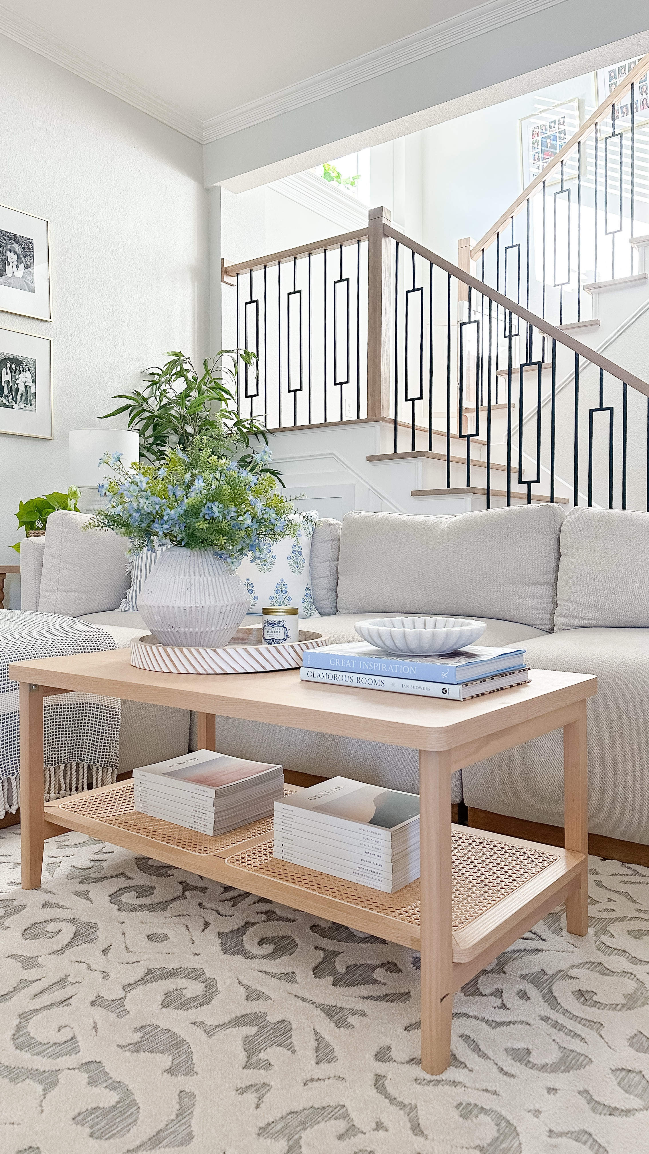 Living room refresh! Spring coffee table styling. Cane coffee table. Blue and green faux florals, textured tray, textured vase, blue and green throw pillows. Amazon, Target. Walmart

#LTKWatchNow #LTKHome #LTKSeasonal