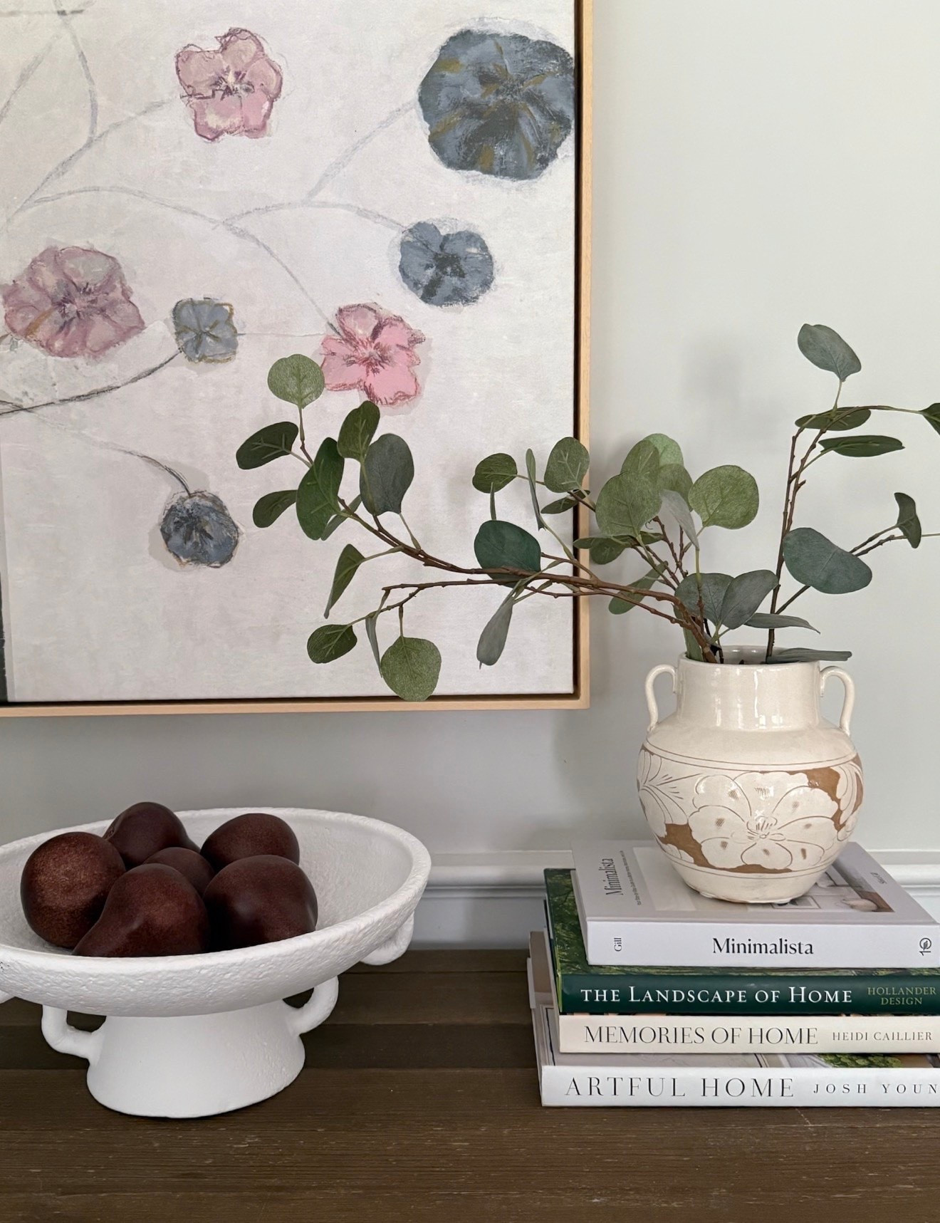 This little vignette is such a beautiful example of simple styling. I love the mix of organic greenery, sculptural faux fruit, coffee table books, and collected decor pieces to create a space that feels layered and timeless.

coffee table styling, faux greenery, decorative fruit, coffee table books, console table decor, organic home decor, neutral home decor, living room styling, collected interiors, timeless home design, home decor ideas, girlonthehudson

#LTKHome #LTKSeasonal #LTKdayinmylife