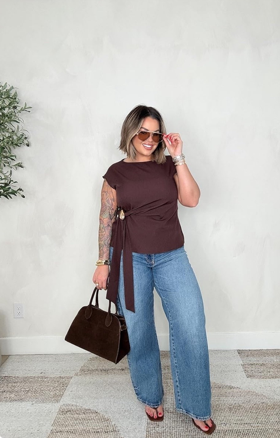 Top L
I added the golden brooch to it 
Linked similar sunglasses 
Jeans are old Zara linked similar that they have on their site now 


#LTKStyle #LTKFinds #LTKCurves #LTKFashion 
#MidsizeOutfit #CurvyStyle #NeutralOutfit #BrownTones #EverydayChic
#EffortlessStyle #ElevatedBasics #MinimalChic #ModernClassic
#WrapTop #StatementTop #WideLegJeans #DenimOutfit #CasualChic
#FallStyle #WinterNeutrals #TimelessStyle #StreetStyleWomen

#LTKSeasonal #LTKMidsize
