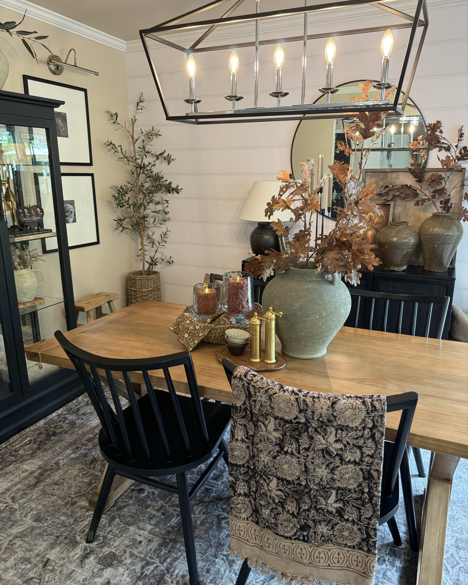 Fall Dining Room Decor Ideas – Cozy Sideboard Styling with Timeless Artwork

Follow @farmtotablecreations on Instagram for more home inspiration.

My fall dining room is layered with warm textures, earthy pottery, and cozy candlelight – but the true standout is the Of Acorns & Amber Light canvas print. 🍂 It’s the perfect finishing touch for fall and brings so much depth and warmth to this sideboard styling. You can use my code FARMTOTABLE for 15% off her artwork! 

Size 12x16 and it’s shown with the 24x24 Earthy Abstract both with Briarsmoke stain. 
Vase on sideboard has 1 oak branch, vase on table has 2.

#falldiningroom #falldecor #sideboardstyling #buffetdecor #diningroominspo #ltkhome #ltkdecor #ltkseasonal #ltkstyletips #tablescapestyling #falldiningroomdecor



#LTKHome #LTKSaleAlert #LTKFindsUnder50