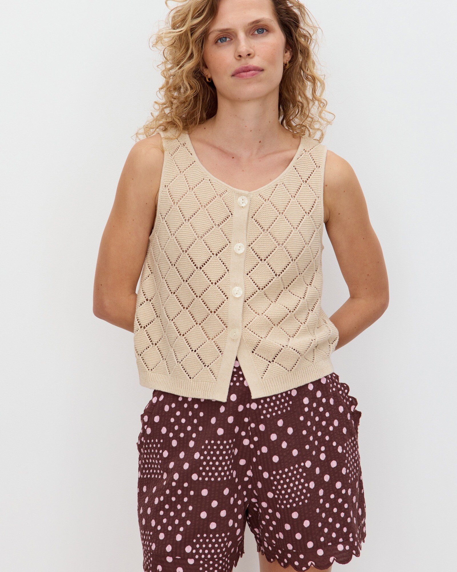 Cream Diamond Stitch Button Up Knitted Vest | Oliver Bonas | Oliver Bonas (Global)