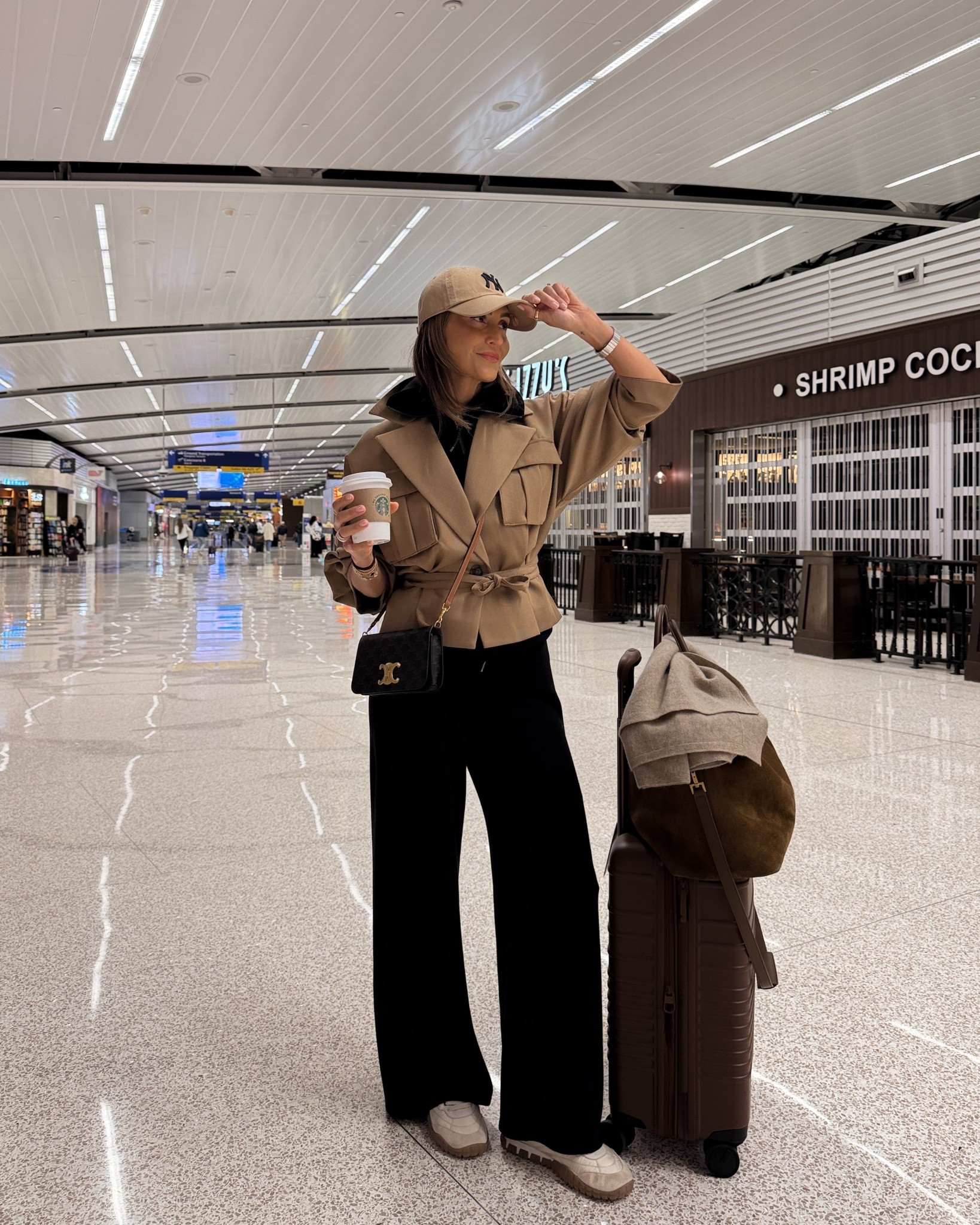 Airport outfit - my set is small and I love how cozy and comfy it is!! Suede duffle bag is my tried and true and loving the new luggage! 
A new addition to the wardrobe is this cropped trench like jacket I’m obsessed and got so many compliments! 

#LTKootd #LTKdayinmylife #LTKTravel