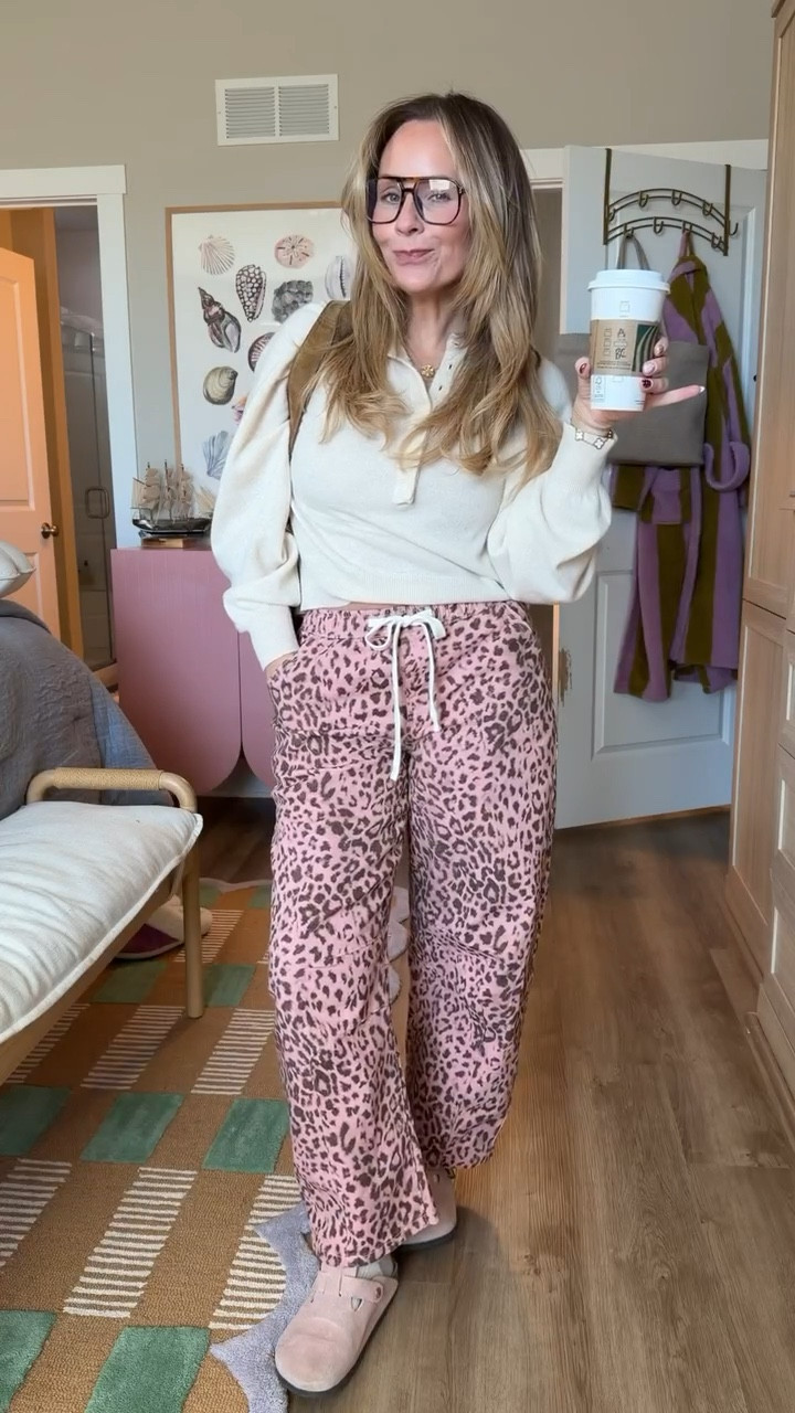 Cozy but make it cute 🤍🐆

This is my current everyday uniform — soft neutral sweatshirt + the comfiest leopard lounge pants that somehow still feel put together. Perfect for slow mornings, school drop-off, or working from home with coffee in hand ☕️

The pants are lightweight, super flattering, and have the best relaxed fit (true to size). Paired with my go-to slippers for that elevated lounge vibe.

Linking everything here — you’ll live in this set. 🫶🏻