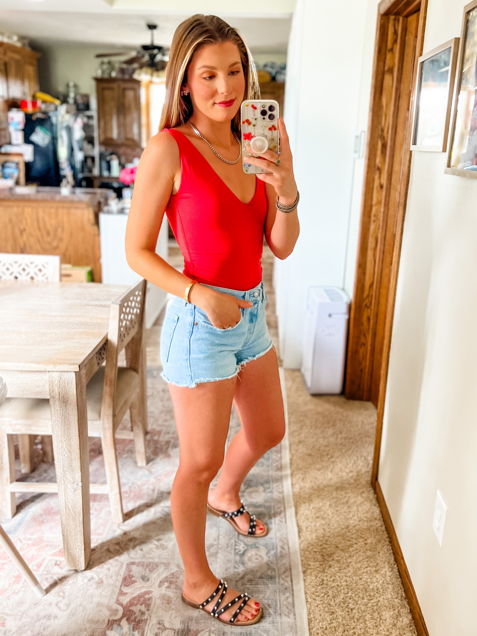 Summer mom uniform - smoothing Amazon body suit that comes in a million colors and high waisted Levi’s denim shorts. 

#LTKSeasonal #LTKunder50 #LTKFind