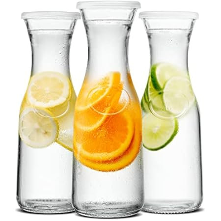 JoyJolt Glass Carafe with Lids. 3 Glass Carafes for Mimosa Bar 36 oz Capacity. 6 Lids! Brunch Decora | Amazon (US)