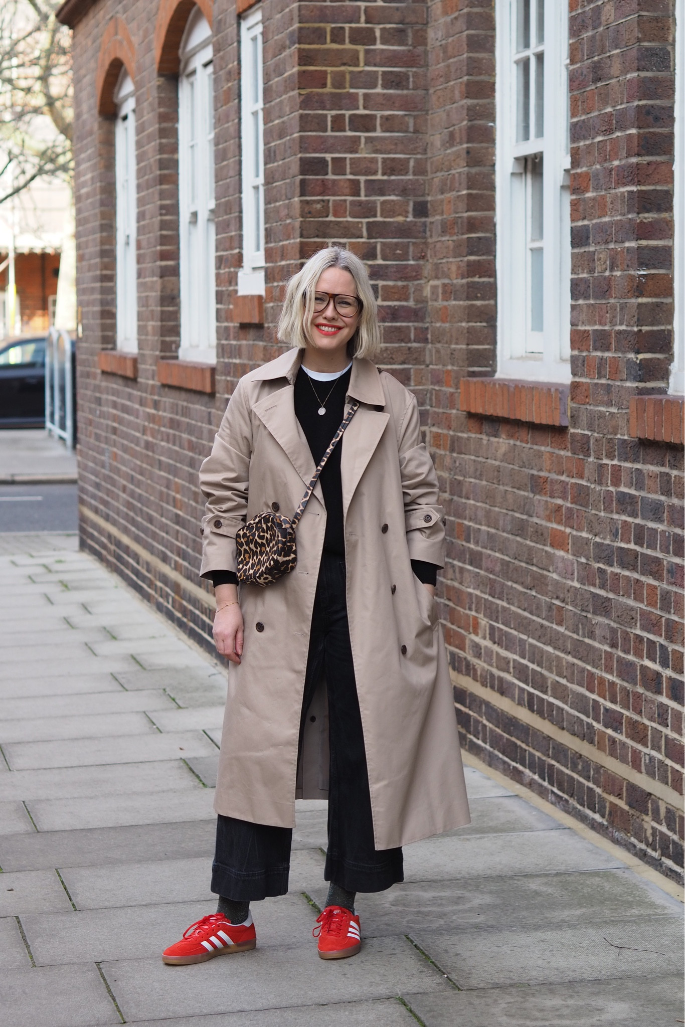 Trench coat season with orange Adidas Gazelles 

#LTKFind
