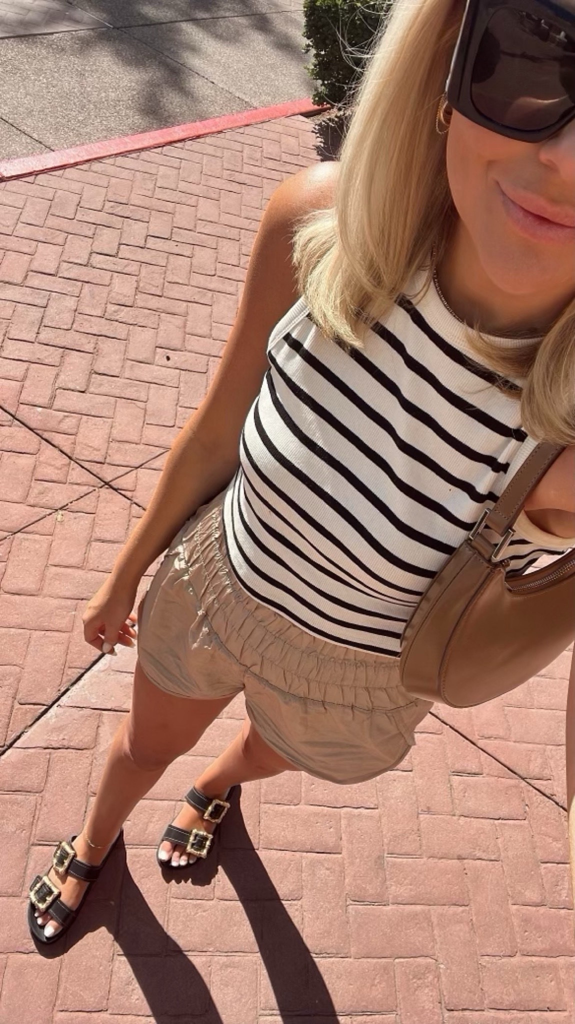 Everyday casual summer look
$10 cropped tank - sized up to a L
$30 Free People athletic shorts 
Chic summer sandals 

#LTKFindsUnder50 #LTKFindsUnder100 #LTKStyleTip