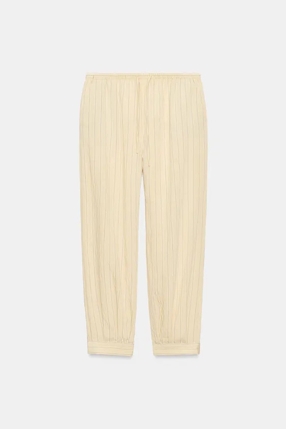 Model height: 179 cmZARA WOMAN COLLECTIONTrousers made from a viscose blend yarn. Featuring a mid... | Zara UK