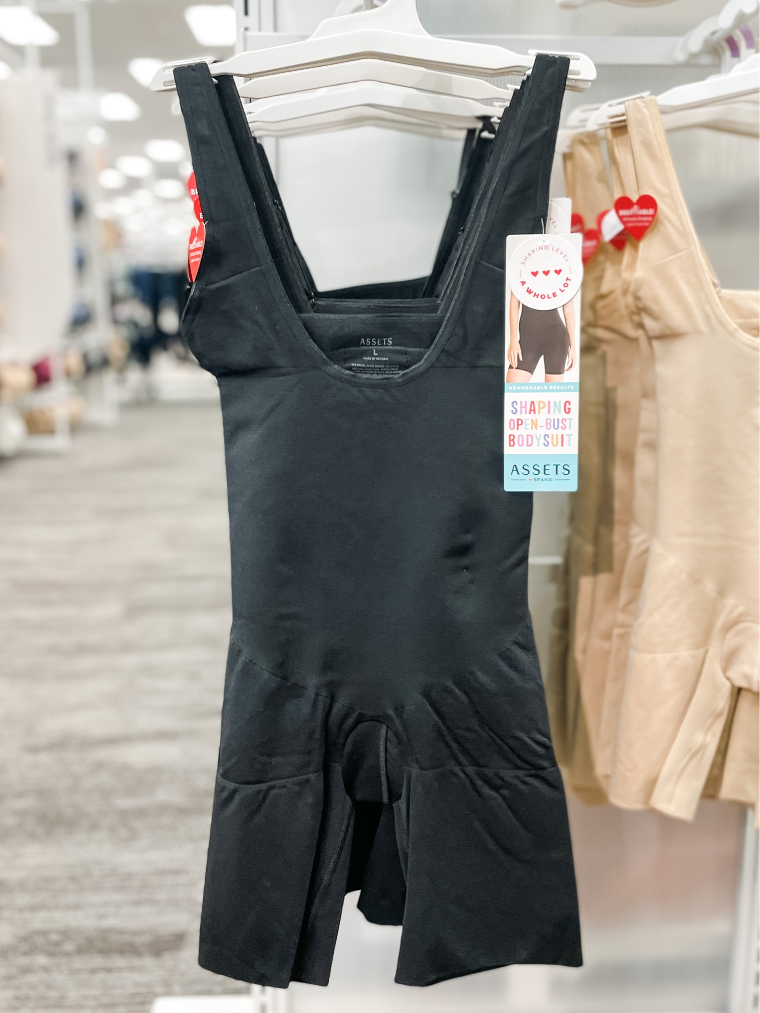 Spanx body suit at Target! Comes in multiple shades & shapes. 

bodysuit | shapewear | black | nude | beige | brown | full body | straps | 

#LTKunder100