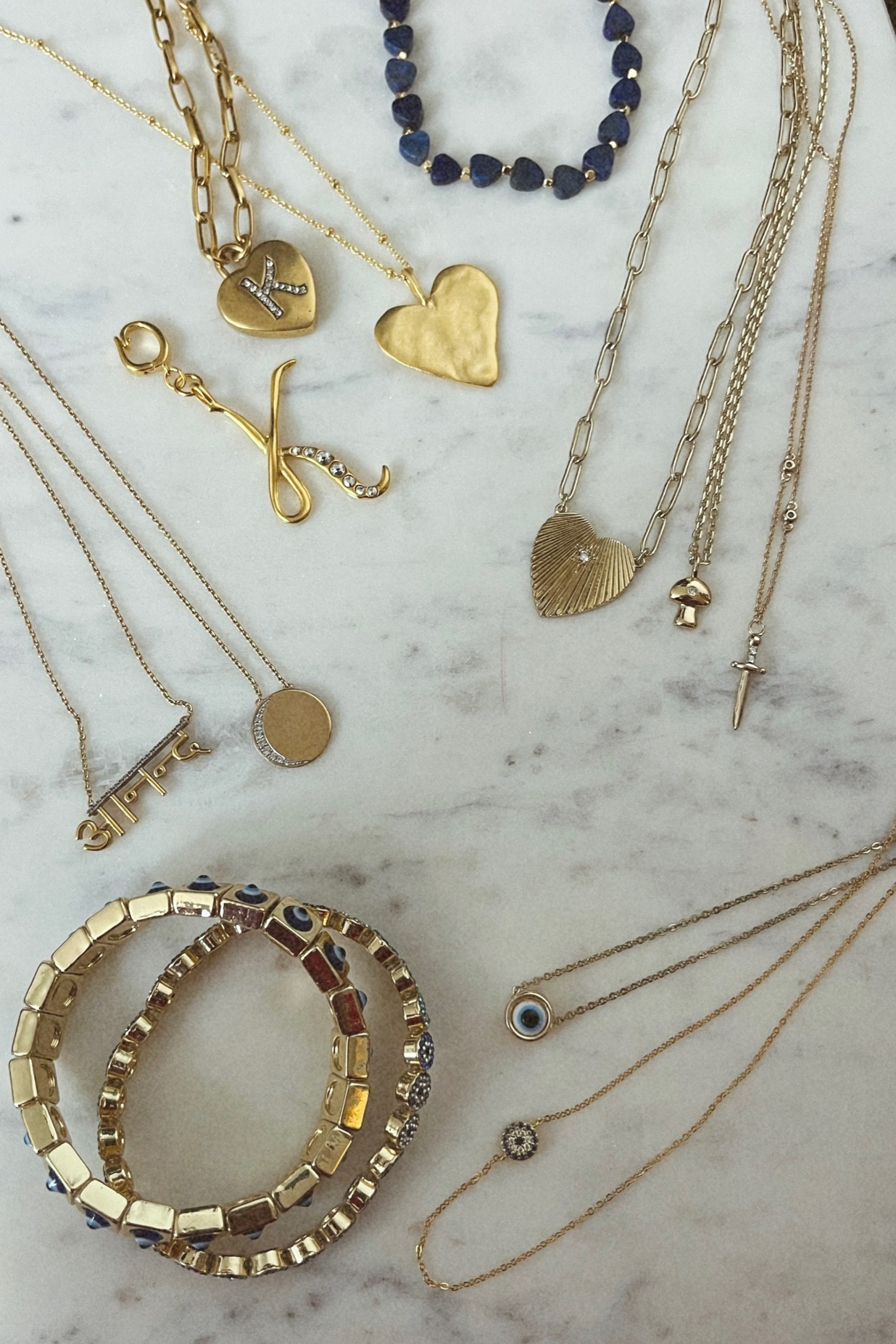 Tik Tok Jewelry Haul: 
Sequin Jewelry - Code: KristinRose20
(Heart necklaces, blue choker and K charm) 
Five and Two Jewelry 
(Heart, mushroom and sword necklaces)
Baublebar Evil Eye Collection 
Prism Jewelry - Code: WILDONE
(moon and ananda necklace) 



#LTKstyletip