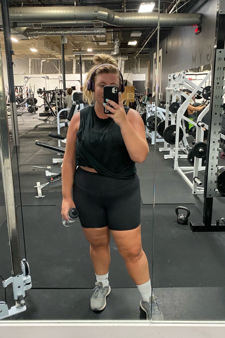 Plus size / mid size workout outfit — what I wore for my weight lifting and jumping gym day. Size down in both tank top and bike shorts  

#LTKcurves #LTKfit #LTKunder100