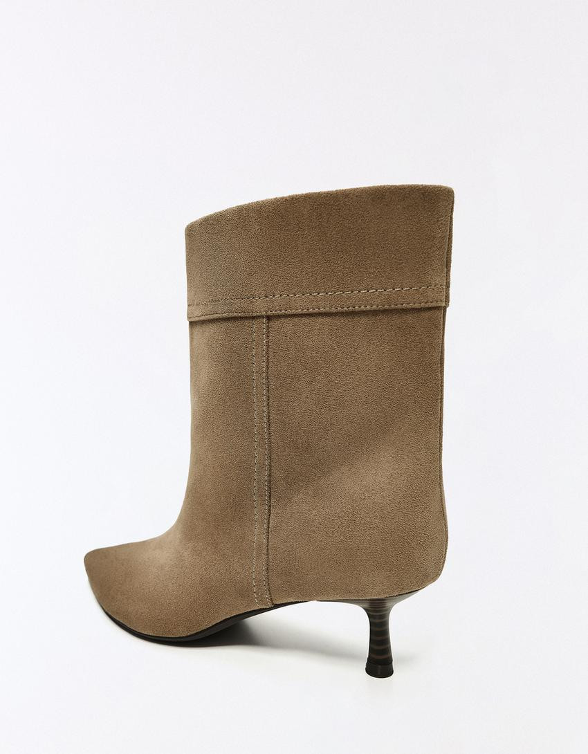 Heeled ankle boots with turn-up detail - Women | Bershka UK