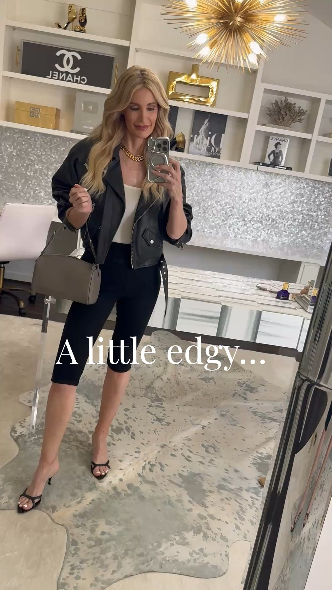 This chic capri pants outfit is such a modern spring trend for women over 40, and it’s one of those looks you’ll either love or want to try in a fresh way.
I paired these Frame capris with a cropped leather jacket for a flattering, updated silhouette, and this Quince bag looks just like a designer piece but at a much better price — so good. 

 #LTKootd #LTKSeasonal #LTKOver40