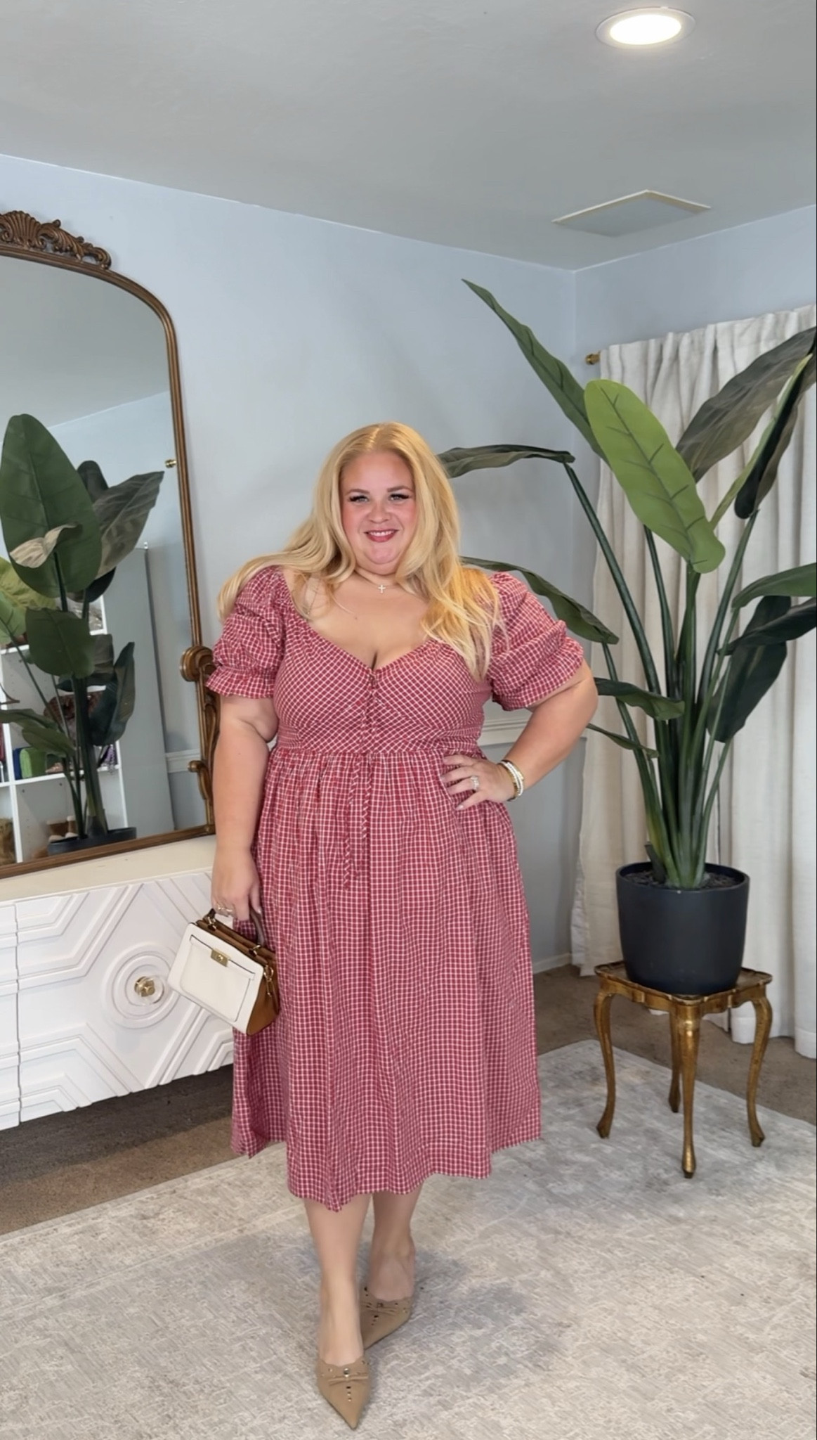 Same dress, styled up 🤎

The smocked top gives shape and support, the waist is actually defined, and the skirt flows without clinging through the tummy or hips. It’s comfortable but still looks polished.

Added a structured mini bag and neutral pointed flats to make it feel more elevated and less casual. This is such an easy spring outfit for church, brunch, showers, or any event where you want to look put together without trying too hard.

Everything is linked in my LTK with sizing details.

#LTKPlusSize #LTKMidsize #LTKOver40