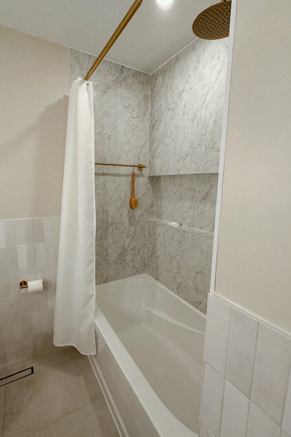 full size marble shower ledge + towel bar with hooks maximize the functionality of this space 

#LTKhome #LTKunder50 #LTKunder100