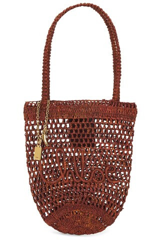 Chloe Summer Banana Bucket Bag in Clay Brown - Cognac. Size all. | FWRD 