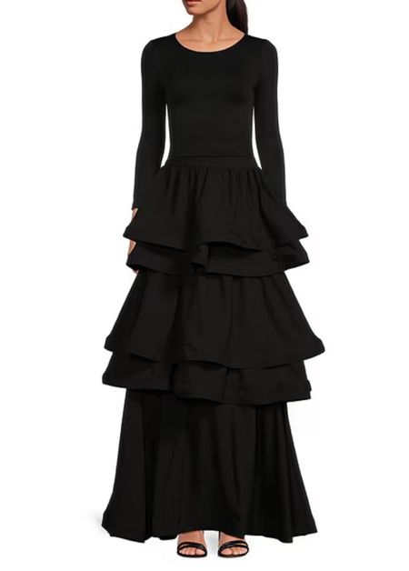 Love this chic top and skirt! 

Buru
Dillards
Ruffle skirt 
Black skirt
Wedding guest outfit 

#LTKGala #LTKover40 #LTKstyletip
