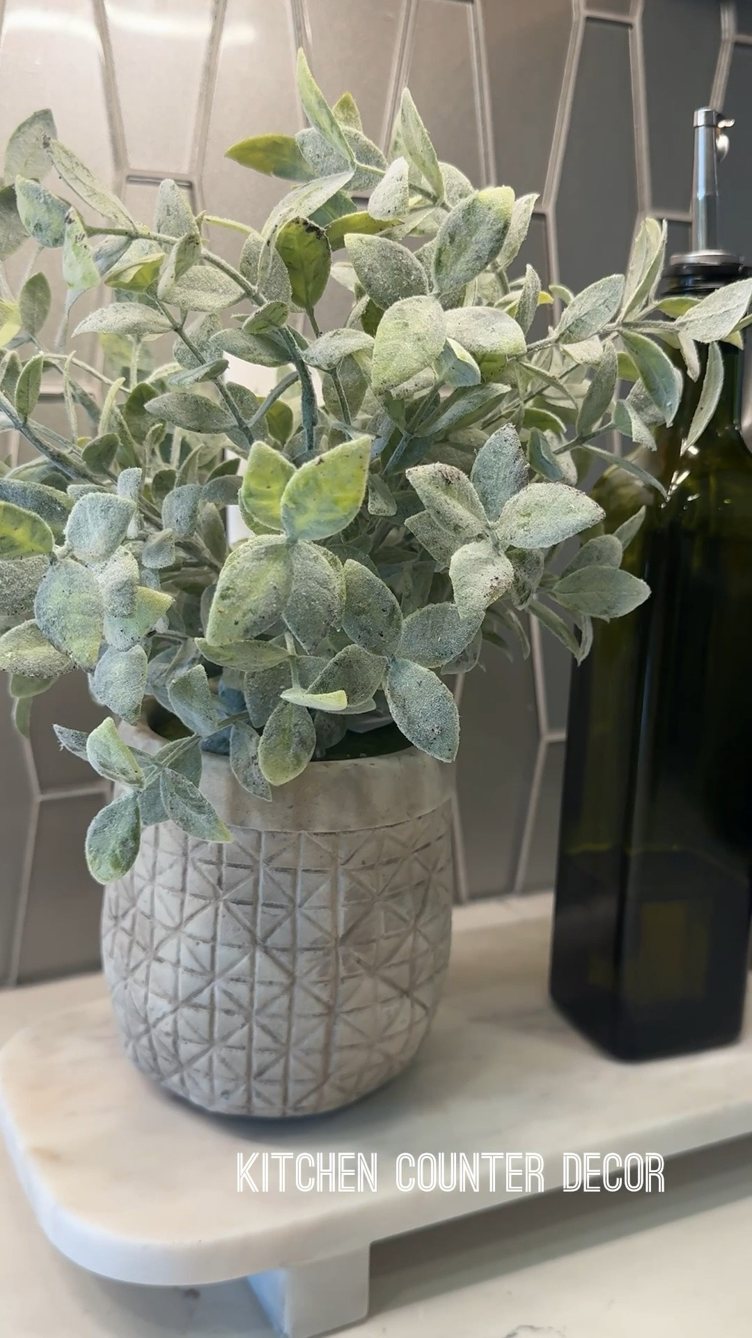 #ad Useful and pretty decor on the counter. We love these glass jars for avacado oil and olive oil. A soft, pretty faux plant adds texture. 
@Wayfair #wayfairpartner #wayfair

#LTKmomlife #LTKHome #LTKSaleAlert