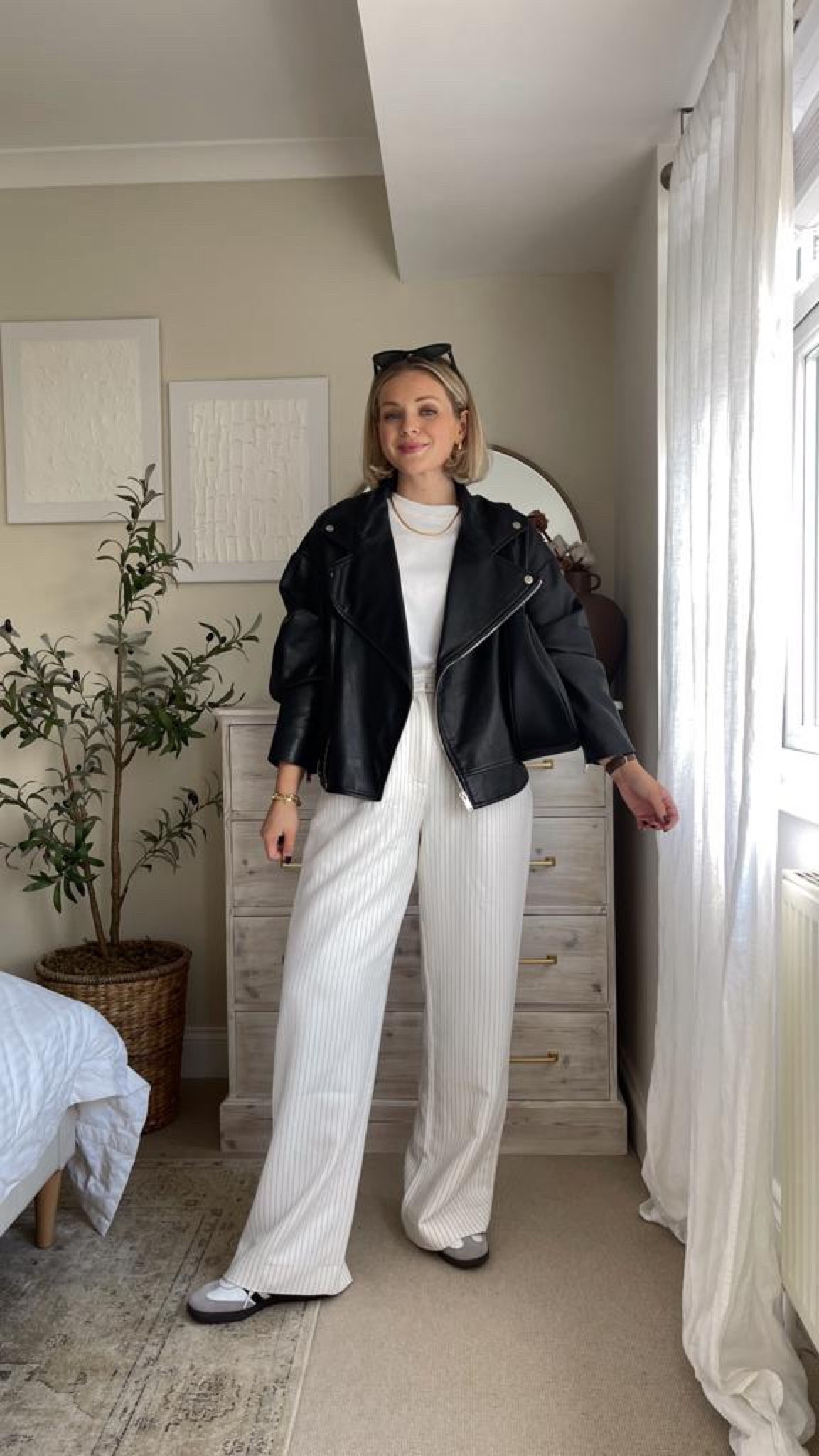 Black & white autumn outfit - black b&ash paris leather jacket, Abercrombie white striped Sloane wide leg tailored trousers, COS white clean cut t-shirt, adidas samba trainers & Katie loxton black Fearne scoop shoulder bag  

#LTKeurope #LTKstyletip #LTKSeasonal