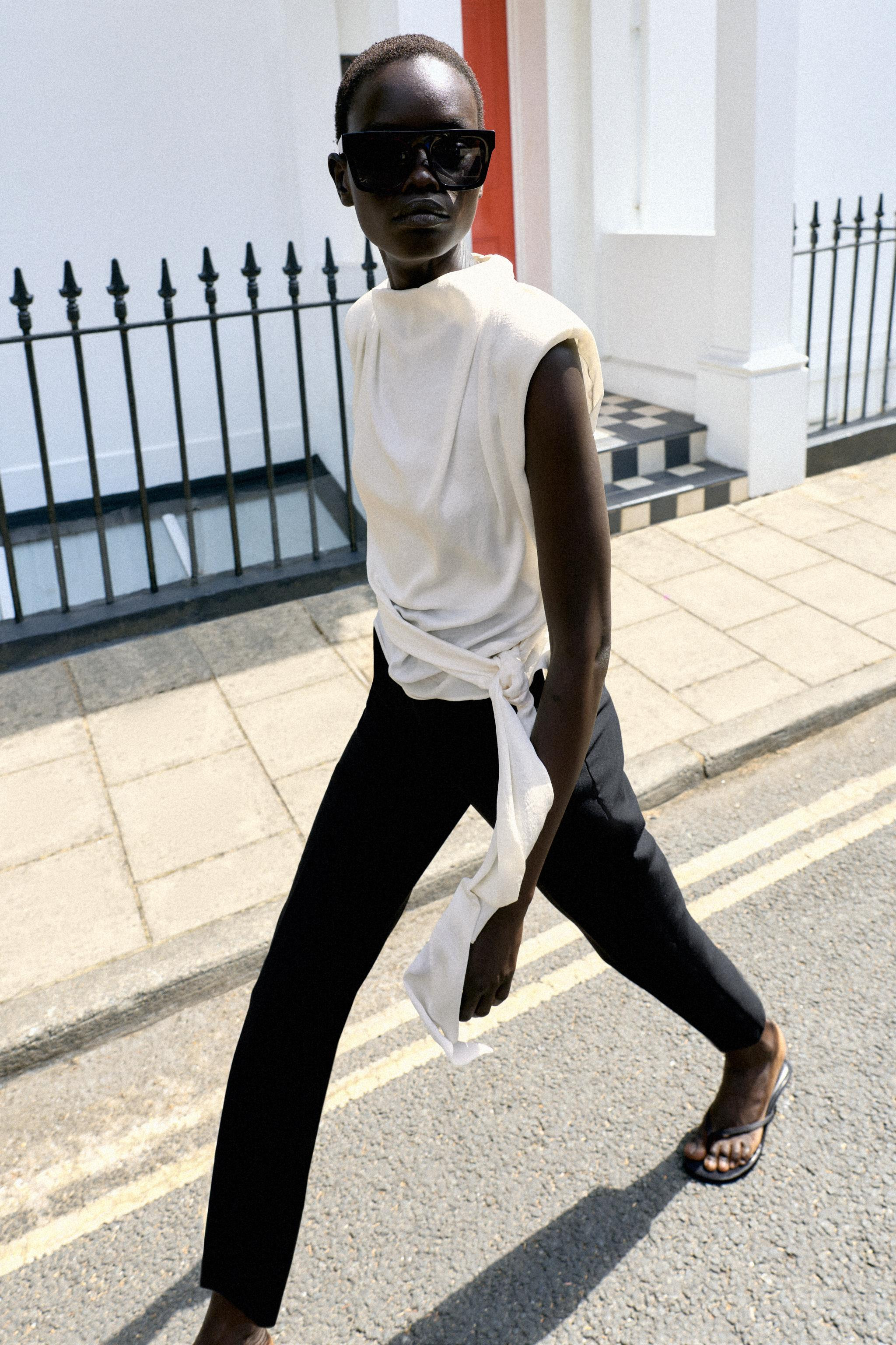 SATIN TOP WITH SHOULDER PADS AND KNOT | Zara UK