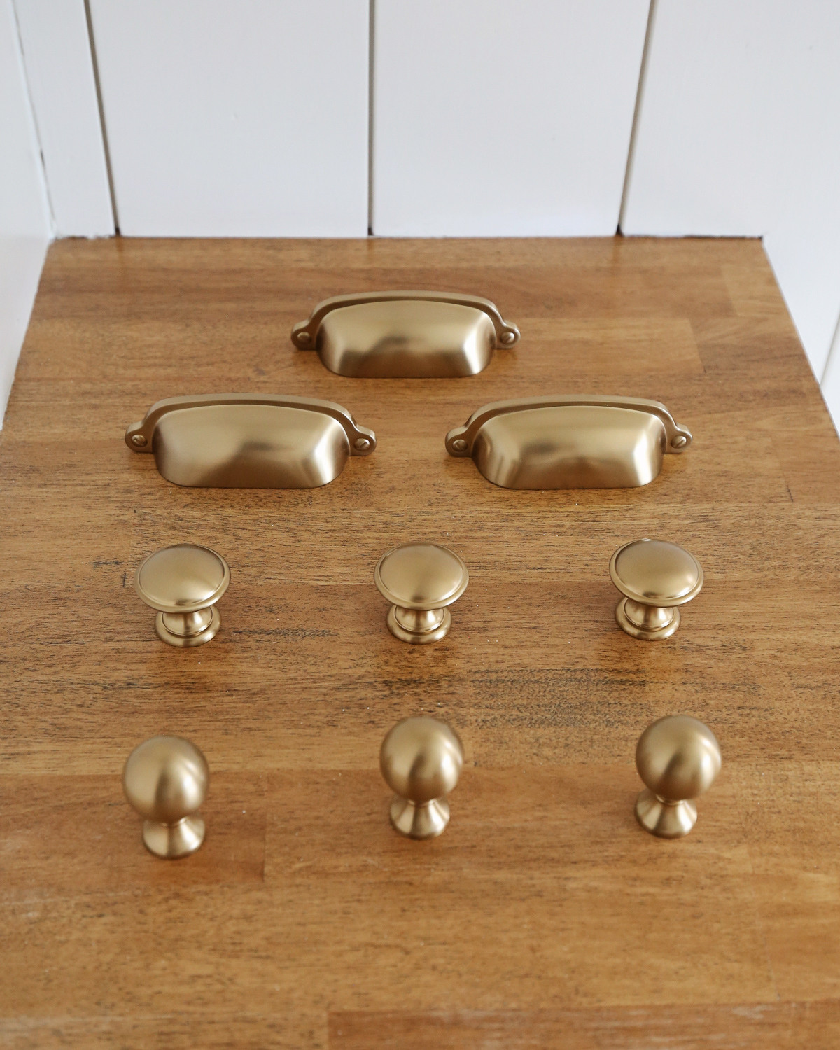 Brass kitchen cabinet hardware, including kitchen cabinet cup bin pulls, mushroom knobs, and ball knobs for kitchen cabinets. Best affordable kitchen cabinet hardware. 

#LTKHome #LTKFindsUnder50