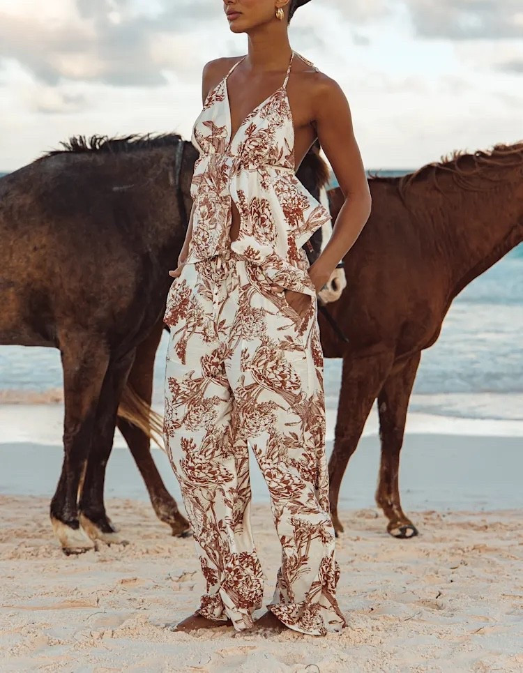 This ivory and brown floral two-piece jumpsuit combines effortless elegance with a chic coordinated silhouette, creating the perfect look for vacations, brunches, and elevated summer styling ✨🤍 Under $80.

Keywords:

* floral jumpsuit
* two piece jumpsuit
* ivory floral outfit
* matching set jumpsuit
* feminine vacation outfit
* elegant summer jumpsuit
* resort wear fashion
* floral coordinated set
* European summer outfit
* vacation wardrobe staple
* brunch outfit inspiration
* destination getaway style
* warm weather fashion
* garden party outfit
* elevated casual fashion

#LTKootd #LTKgrwm #LTKTravel