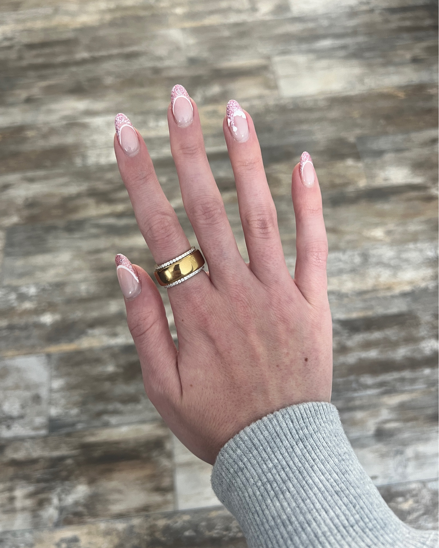 Happy early Christmas to me! My new Oura ring stack and girly pink Christmas nails! 🎅🏼🪩💅🏼🎄
Took advantage of the gen 3 sale and I’m obsessed, wearing a size 8 (one size up from my normal ring size). Check out both Amazon and Target for your size because availability is different but selling out fast. The stackers are 18k gold vermeil from amazon. 

#LTKGiftGuide #LTKFitness #LTKActive