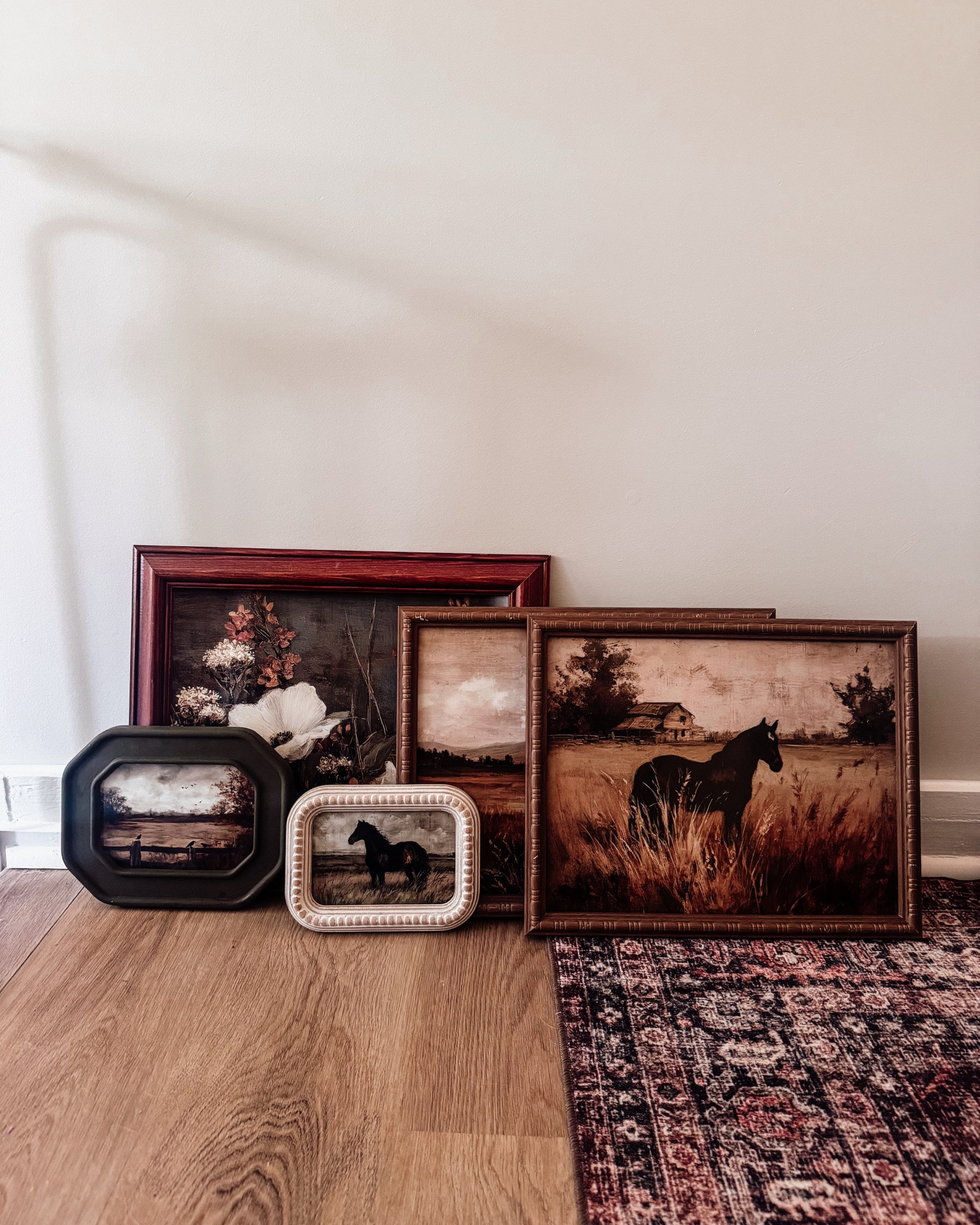 Giving old frames a whole new life. 🖼️✨ I took a bunch of frames I already had lying around, downloaded a few vintage-inspired prints off Etsy, and printed them out. Proof that a budget-friendly refresh can completely change the feel of a space!

#LTKSeasonal #LTKHome