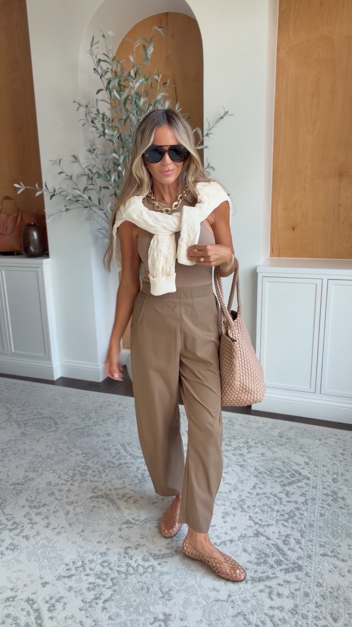 Elevated travel outfit featuring the pants I can’t stop wearing! Barrel leg athletic pants - so comfy and wrinkle resistant! Paired with a seamless bodysuit and sweater plus some elevated accessories for an easy yet chic travel outfit!

#airportoutfit #traveloutfits

#LTKgrwm #LTKootd #LTKTravel