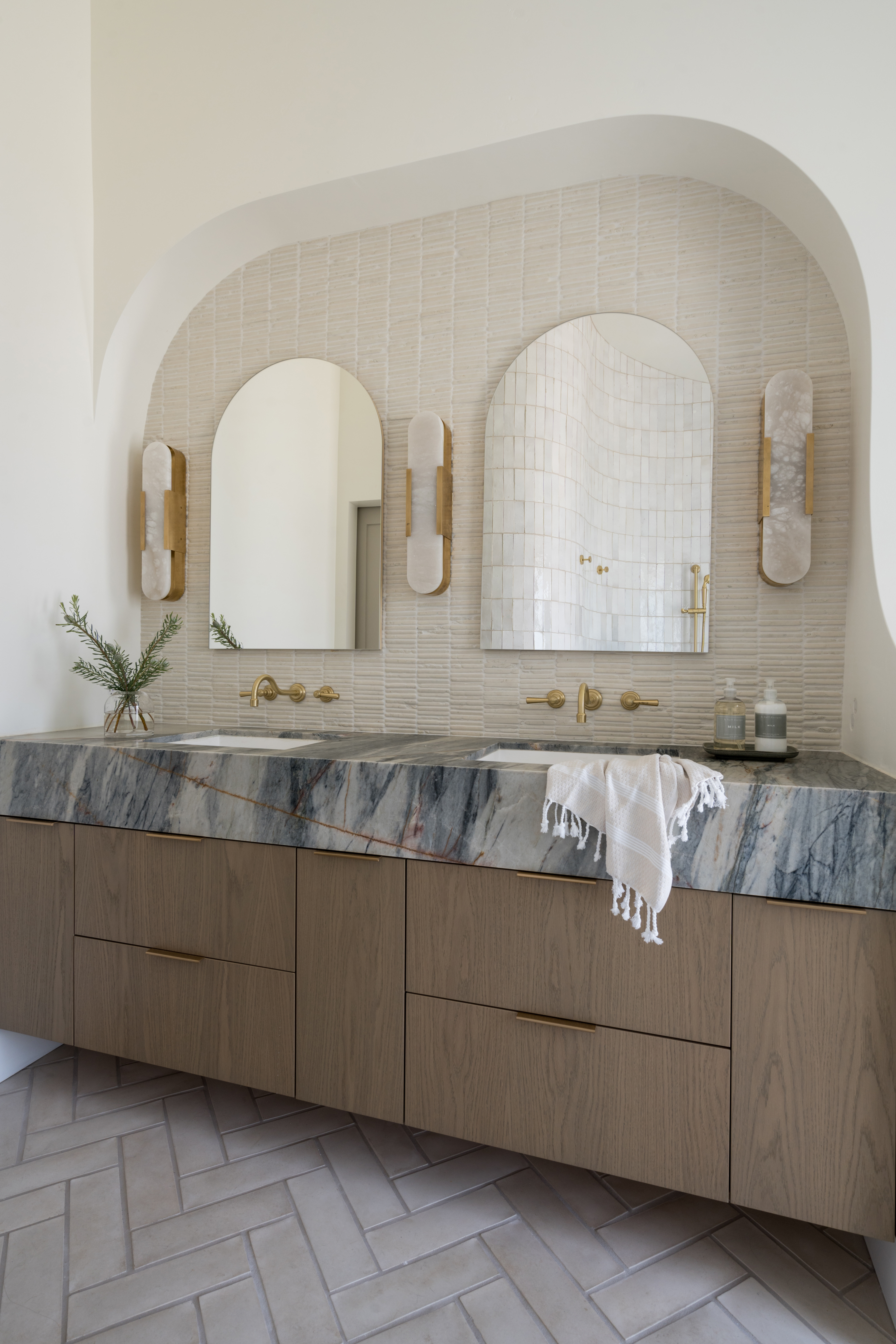 All of the products from this organic modern bathroom renovation: alabaster lights, brass faucets, arched mirrors and more! 

 

#LTKHome