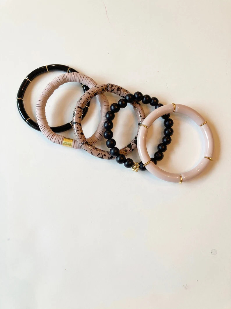 Read the full title
    Mauve+Black splatter stack | Etsy (US)