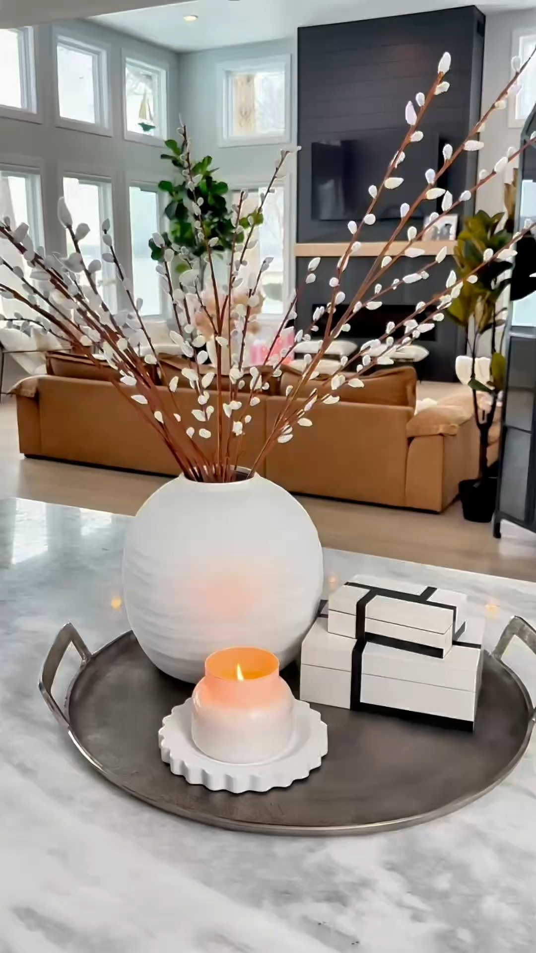 Simple & Elegant White Centerpiece: A Stunning Neutral Decor Idea

Looking to create a timeless and elegant white centerpiece for your home? This neutral decor idea is effortlessly chic and perfect for any season!

I started with an oversized aluminum tray as the base to anchor the look. A white vase filled with tall pussy willow branches adds height and natural texture. To create layers, I stacked two decorative boxes, adding depth and dimension. A classic marble candle holder topped with a candle completes the design, bringing warmth and ambiance.

This minimalist centerpiece is perfect for a coffee table, dining table, or entryway. Its monochromatic white color palette keeps things fresh and modern, while the mix of textures—aluminum, marble, and natural branches—adds visual interest.

White Decor, Neutral Home, Elegant Centerpiece,  Minimalist Decor

#LTKHome #LTKWatchNow #LTKStyleTip
