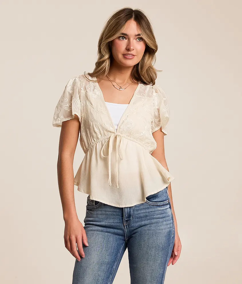 Embroidered Peplum Top | Buckle