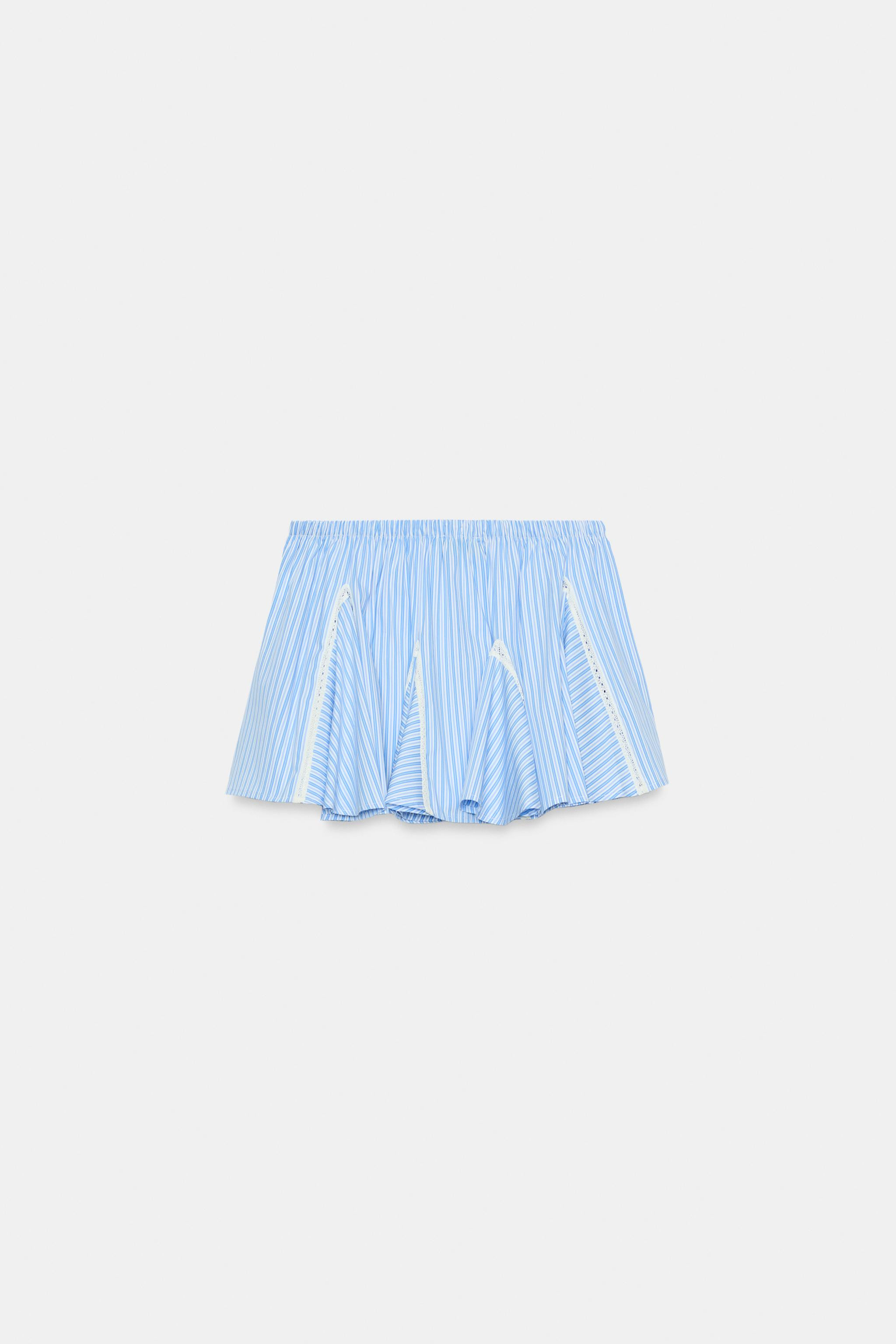 Model height: 181 cmMid-waist mini skirt. Elasticated waistband with adjustable drawstring fasten... | Zara UK