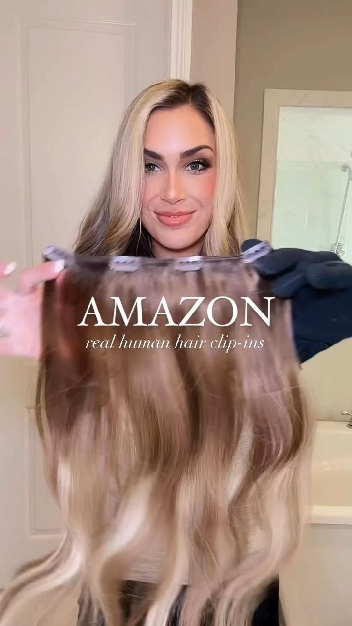 My top selling product EVER. Real human hair clip in extensions. 

Wearing the color Ombré Walnut Brown to Ash Brown/Beachy Blonde.  In the fall/winter when my hair is darker I use the other set I have which is the color “chocolate brown to honey blonde”. 22 inches

If it’s not a perfect match you can send them back so no worries on guessing, but mine were spot on 👍🏼 

Amazon hair extensions , clip in hair, Amazon finds, real hair extensions , hair products 

#LTKBeauty #LTKFindsUnder100