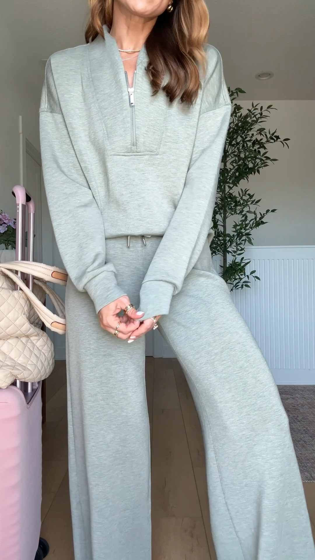 Code LTKSPANX. My all time favorite travel sets! Spanx AirEssentials matching set in XS petite pants and XS top. Airport outfit. Travel outfit. Tory Burch sneakers - I sized up half a size! My favorite travel tote with a million pockets! Beis luggage with cover. 

#LTKPetite #LTKSpringSale #LTKTravel