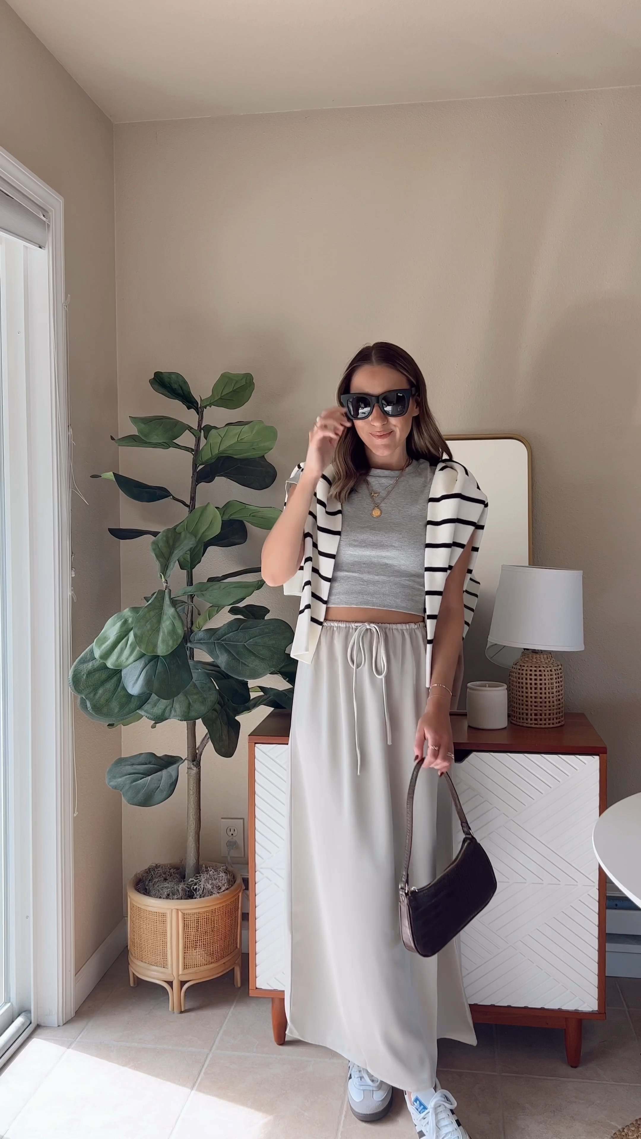 Casual fall outfit from Amazon🍂 wearing a xs tee, small drawstring skirt and medium striped sweater

Amazon fashion / fall style / sambas outfit / silk skirt / amazon outfit



#LTKfindsunder50 #LTKstyletip