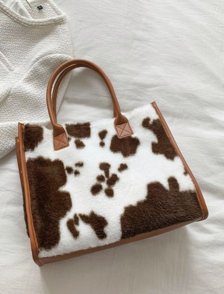 How cute is this cow print fuzzy Sherpa tote?! 

Price point is below $20! 



#LTKitbag #LTKFind #LTKunder50